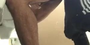 Guy fucks a hairy man and cums in his ass in public bathroom