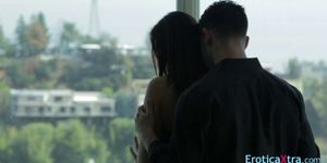 Hot couple makes out near the window