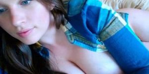 Cute blue eyed brunette showing her tits