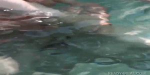 Redhead hottie eats cock underwater for cash