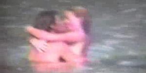 Naked couple at beach - voyeur video