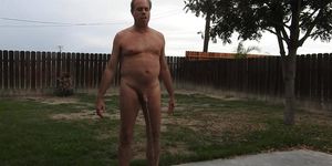 A naked daddy pees in public for his pornsite fans.