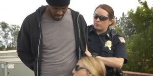 White Female Cops On A Roof Sucking Off Black Suspect Together