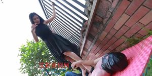 Chinese mistress trampling and ballbusting