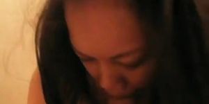 Asian woman tickling penis head - video 2