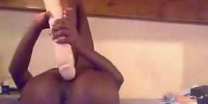 Naughty black babe on webcam fucks herself with huge dildo and teasing - video 1