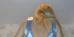 Sexy MILF spits on her silver satin dress