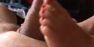 Wife gives hot footjob with quick cumshot
