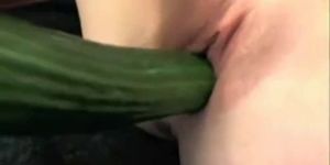 Skinny nerdy girl masturbating with huge cucumber on cam