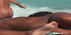 Nudist teen not shy about posing nude at the beach - video 1