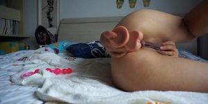 Amateur Asian teen uses several toys and anal beads