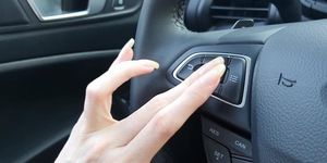 Fantasynail scratching car elements by her long nails