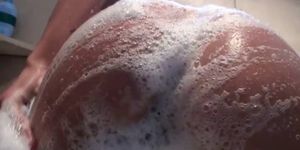 Soapy horny brunette with big luscious boobs