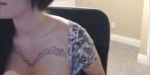 Busty tattoed teen toying and squirting on chair