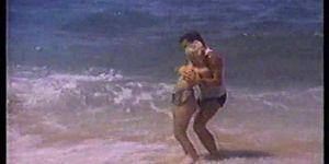 Peter North shags a hot blonde on the beach