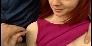 Outdoor redhead teen plays with two cocks