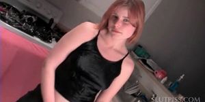 Redhead teeny stripping naked fills glasses with her piss