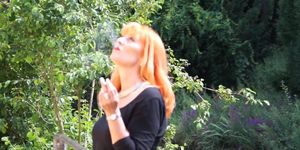 Mature German Smoker Claudia by the river