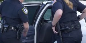 Blonde Female Cop On Her Knees Sucking Black Dick Outdoors