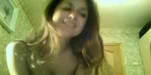 Russian amateur stripping in her bedroom