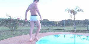 white wet boxers fine-looking young hot guy shows off at the pool