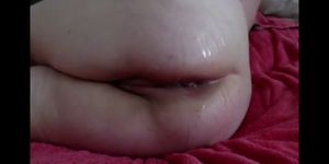 Curvy amateur inserts a vibrator up her oiled anus - video 1