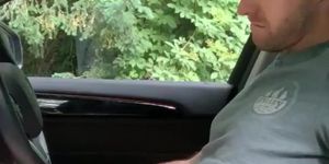 Guy jerking in his car