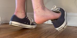 Barefoot shoeplay & dangling in dirty converse sneakers