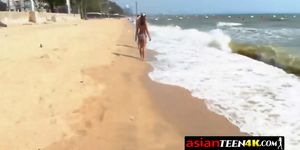 Tourist is fucking with two horny Asian teens during his summer vacations