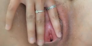 Pink shaved pussy lips spread open
