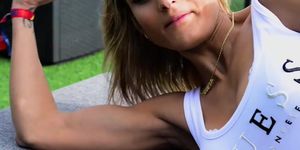 Bouncing her biceps in a sexy kinda way