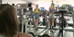 Lesbian beauties enjoy threeway after gym - video 1