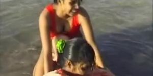 2 Indian girls with white guy in beach have fun blowjob