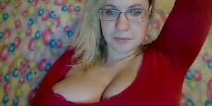 Busty takes her tits out for the webcam