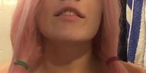 pink haired girl begs for cum on her face while rubbing her boobs