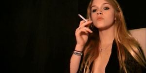 Sexy Blonde smokes and displays her tits