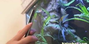 sexy naked darkhair on aquarium - video 1