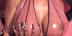 Mega boobs in latex