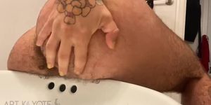 Hairy FTM Squirts Enema into the Sink