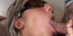 Gagging with her sunglasses on