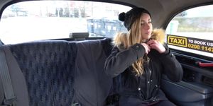 Blonde in boots fucks in fake taxi