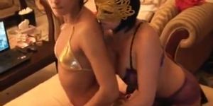 Kinky lesbian babe in mask strap part1