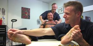 Edged sub gets tickled and jerked by doms