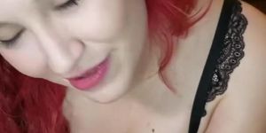Redheaded Vixen worships dick with sloppy blowjob
