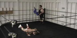 Pro Wrestling Heel clobbers Pro Jobber in the ring