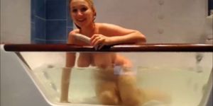 Insane big tits blonde in a glass