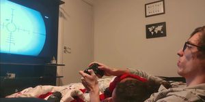 Sucking step brother's dick while he plays GTA