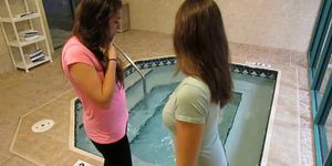 Clothed Lesbians in Indoor Pool