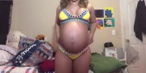 Preggo Mommy Tries on Tiny Bikinis