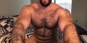 Muscle bear jerks and cums